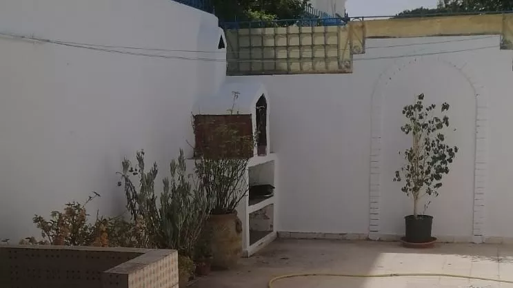 Ground Floor of Villa Britta on Route du Malaaga, La Marsa: Your Dream Haven Awaits!