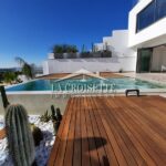 Photo-1 : Villa neuve S+3 avec piscine et vue mer à Gammarth