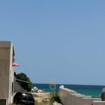 Photo-1 : Bungalow S+2 avec terrasse au bord de la mer située à Lido, Nabeul