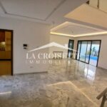 Photo-4 : Duplex S+3 avec chambre de service, jardin et piscine à La Soukra MDV0161