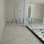Photo-10 : Splendide duplex front lac