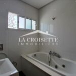 Photo-8 : Duplex S+4 avec jardin et piscine aux Berges du Lac 1 MDL0687