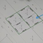 Photo-3 : Terrian pieds dans l&rsquo;eau