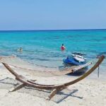 Photo-1 : Terrian pieds dans l&rsquo;eau