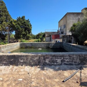 DOMAINE DE 10840 m² AVEC VILLA ET DÉPÔT à TAZARKA
