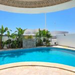 Photo-11 : Villa de Style Américain avec Appartement Indépendant et Vue Mer
