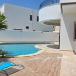 Photo-9 : Villa de Style Américain avec Appartement Indépendant et Vue Mer
